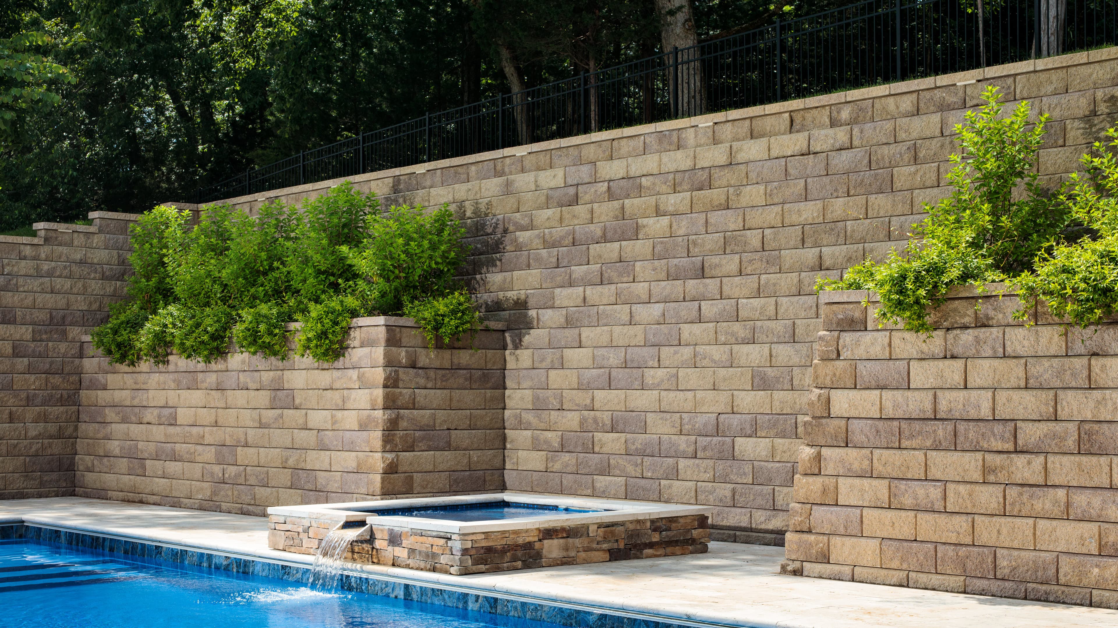 Outdoor living space with retaining wall